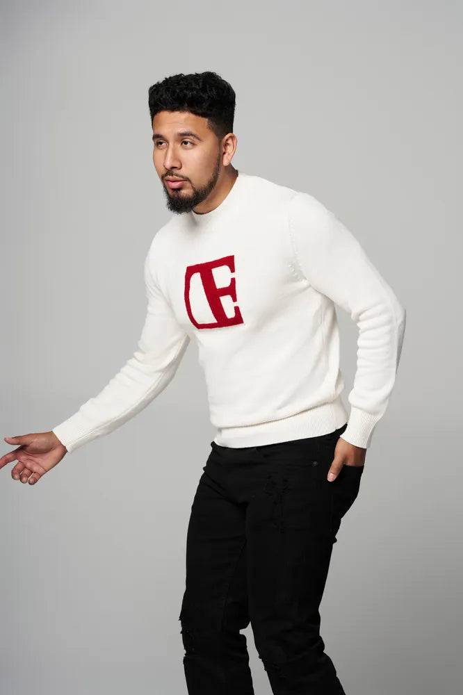 a man is wearing Cream -Red Label Sweater