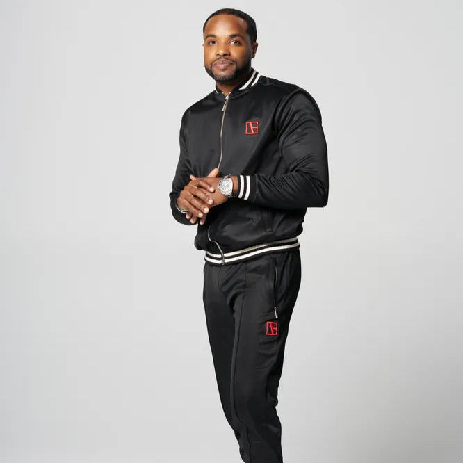a man is standing wearing Black-Red Label Tracksuit
