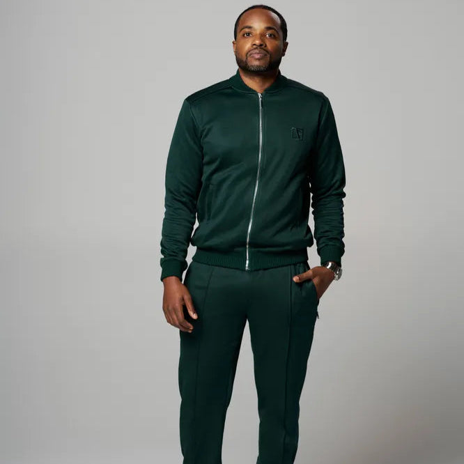 a man is wearing Forest Green Executive Label Tracksuit