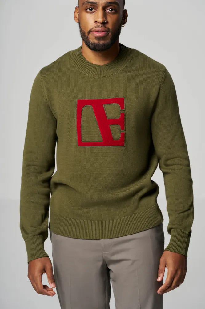 a man is wearing forest Green-Red Label Sweater