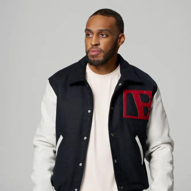 a man is wearing Navy Blue-Red Label Letterman
