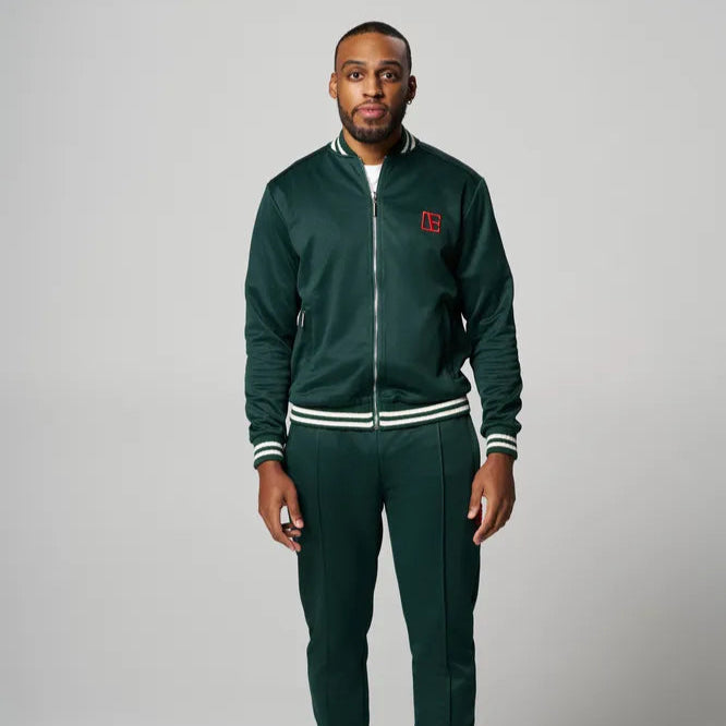 a man is wearing Forest Green Red Label Tracksuit
